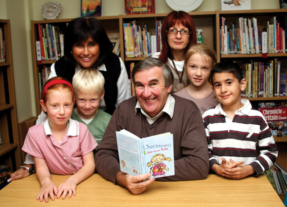 Gervase Phinn with some little treasures at Town Field Primary School