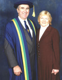 Gervase wearing cap,  gown and special tie with Christine